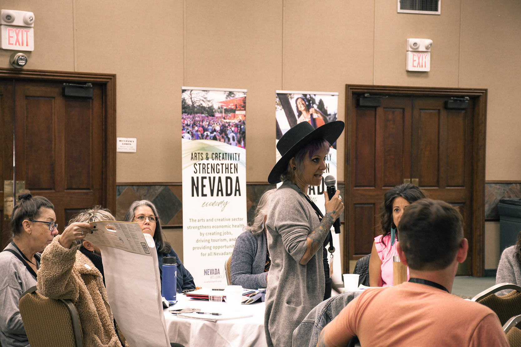 Person with a hat participating in 2023 BRX conference.