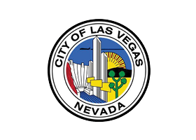 City of Las Vegas, Nevada seal featuring buildings, a sunrise, a Joshua tree, and red mountains, all within a circular design bordered by the city and state name.