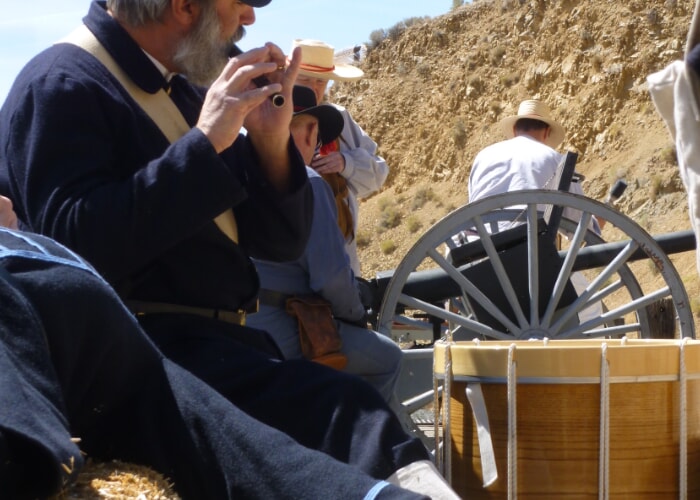 Civil War re-enactment actors in the background of the Nevada desert.