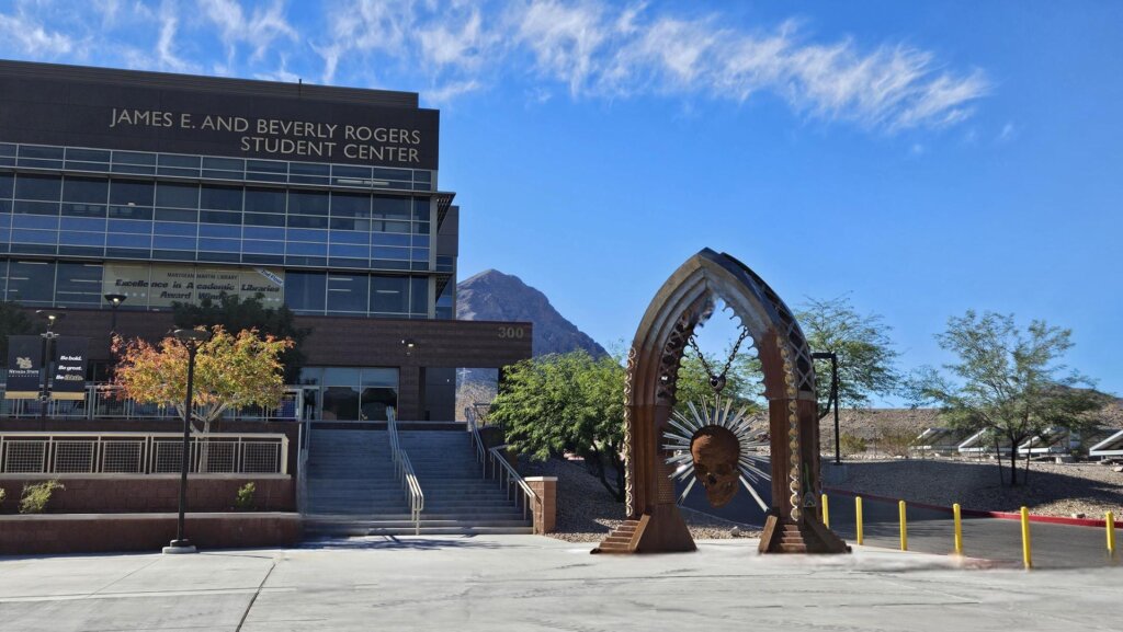Peso Neto by Luis Valera-Rico, a large-scale steel sculpture that pays homage to Mexico’s rich heritage and is a celebration of Mexican-indigenous and Spanish colonial architecture. Peso Neto is on view from dawn to dusk in the Plaza at Nevada State University from Oct. 20, 2025–Nov. 9, 2025. Keep yourselves and the sculpture safe. Please do not climb.