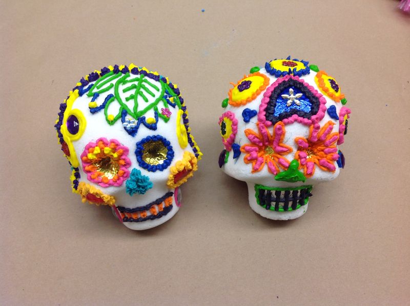 Two sugar skulls