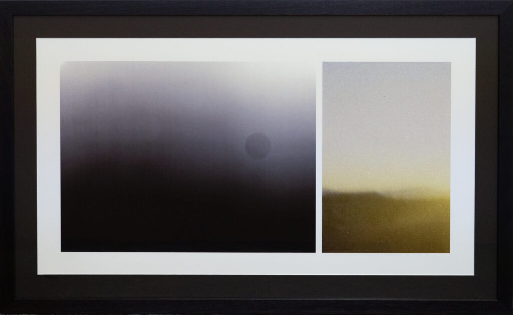 Framed artwork with two abstract panels: the left panel shows a dark, misty gradient with a faint circle, while the right panel displays a lighter, yellowish haze with soft, blurred textures.