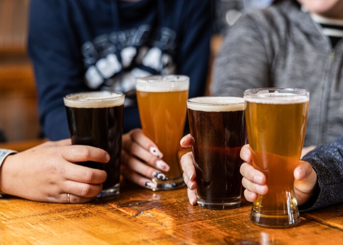 Found beers being held in hands